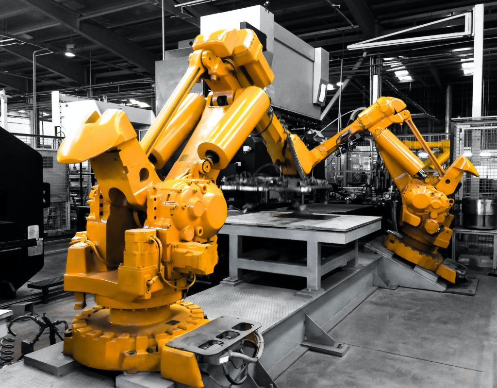 Industrial robots in production line manufacturer factory