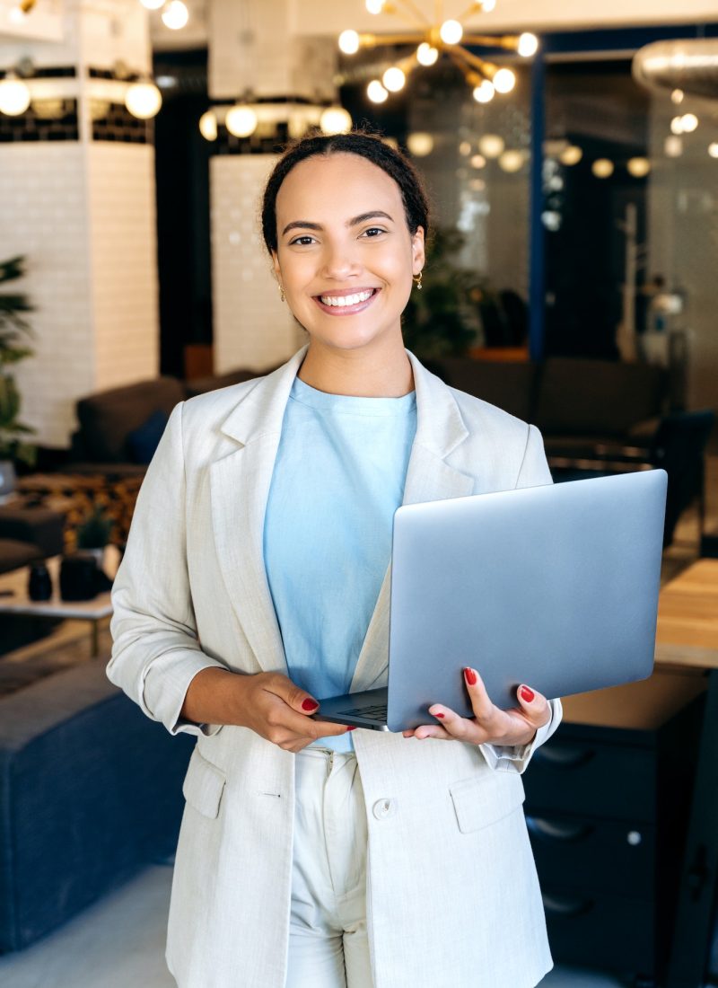 Vertical photo of a gorgeous confident successful mixed race woman, in elegant clothes, seo, top
